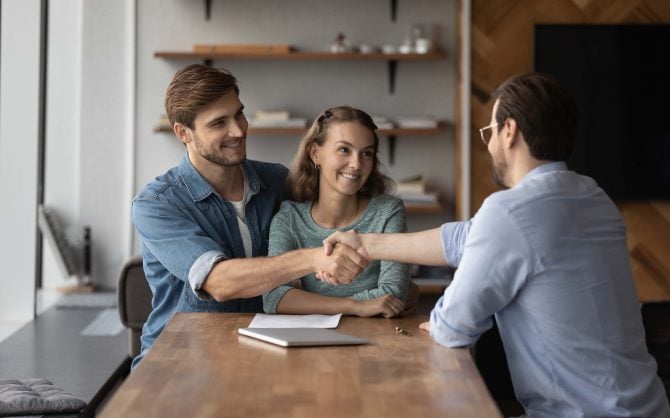 **Alt text (14 words):** Ascend Business Brokers connecting business owners with handshake agreement during a consultation meeting.
